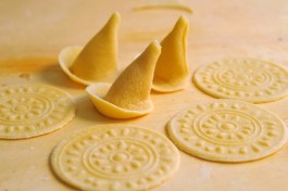vintage wooden stamp was used to mint pasta like coins