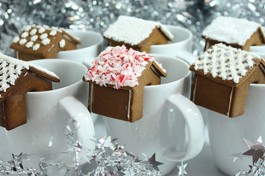 gingerbread house that perches on edge of a mug