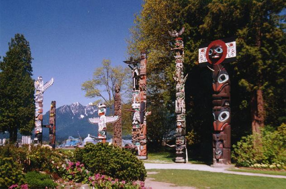 totem poles at stanley park, vancouver totem poles at stanley park, vancouver