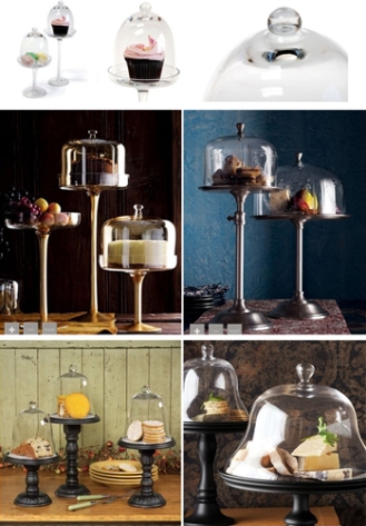 Decorative pastry stands with glass domes