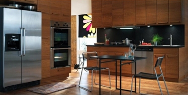 AKURUM kitchen system with NEXUS honey brown fronts