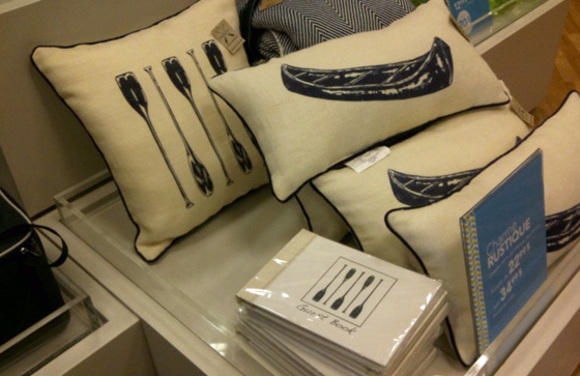 cottage decor :: canoe cushions and guest book