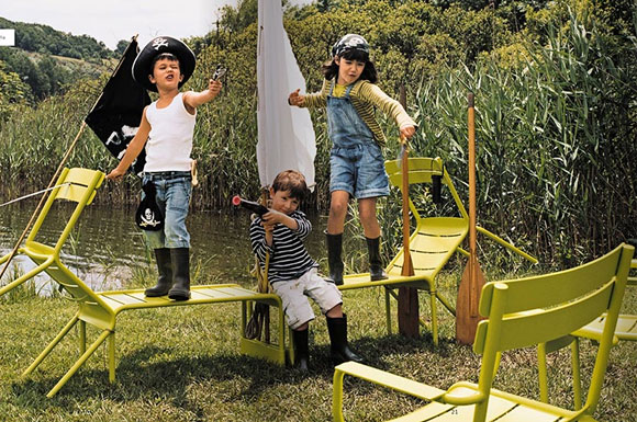 fermob yellow pirate boats built with garden chairs and paddles