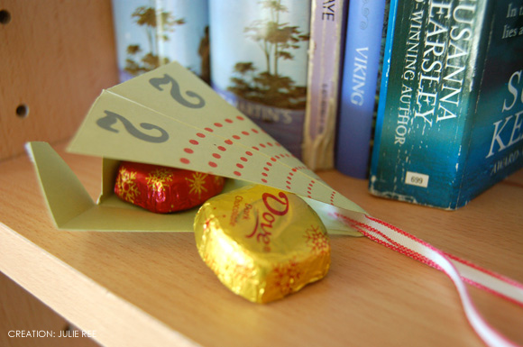Small chocolates fit inside the paper pyramids for an advent calendar project
