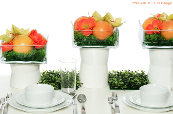 citrus centerpieces by o.xide design