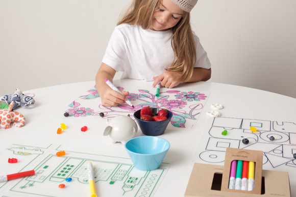 dwell studio kidz box with little girl coloring a placemat by modern twist