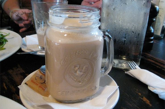 latte served in drinking jar at griffintown cafe