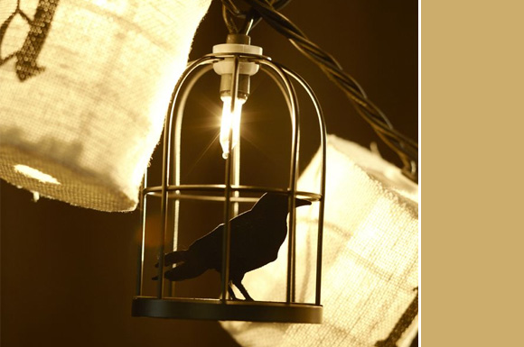 caged crow string lights for halloween