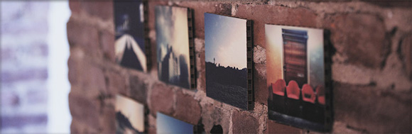 deepsquare instagram prints hung on a wall